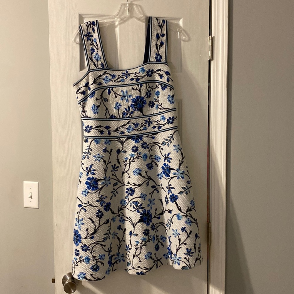 Anthropology blue and white floral above knee length, flared with pockets